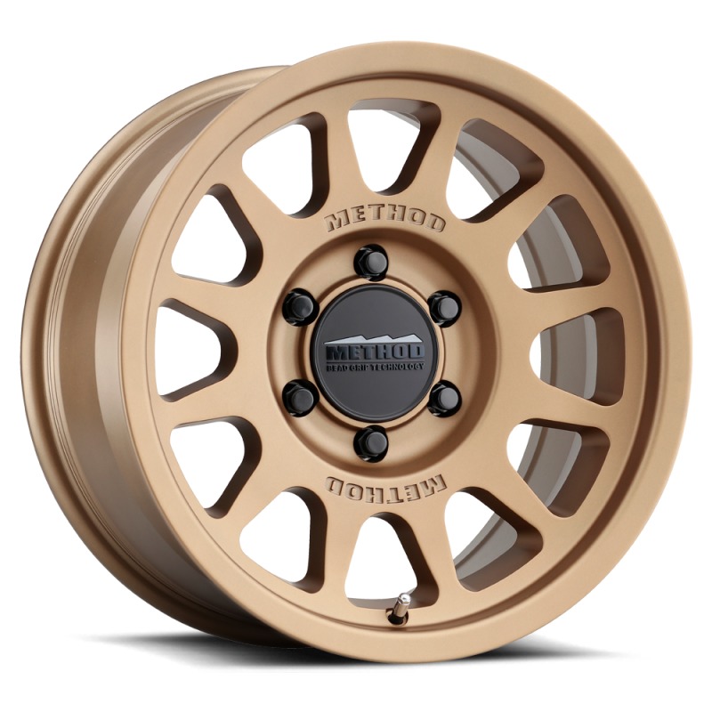 MR703 17x8.5 0mm Offset 6x135 87mm CB Method Bronze Wheel - Click Image to Close