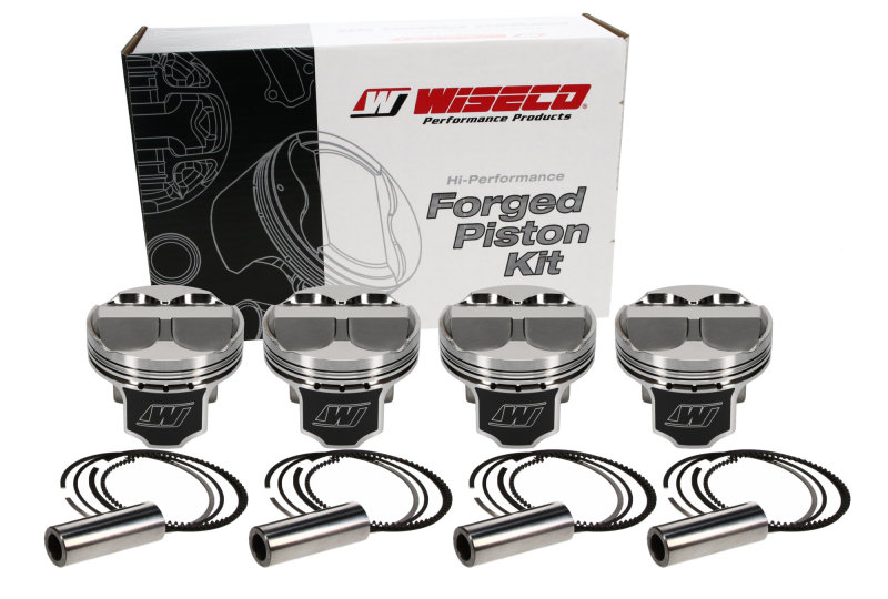 Wiseco Domed +8cc Strutted 86.5MM Piston Kit Fits Honda K20A/Z - Click Image to Close